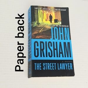 “The Street Lawyer” a paperback by John Grisham!